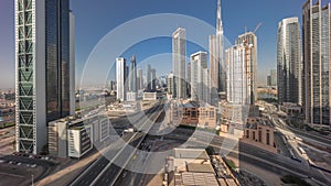 Aerial panoramic view of Dubai Downtown skyline with many towers timelapse.