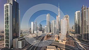 Aerial panoramic view of Dubai Downtown skyline with many towers timelapse.