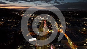 Aerial panoramic view of evening city against twilight sky. Illuminated boulevard in Studio City district. Los Angeles
