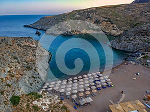 Aerial panoramic view of the famous rocky beach Melidoni in Kythira island at sunset. Amazing scenery with crystal clear water and