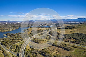 Aerial panoramic view of Glenloch Interchange and Lake Burley in Canberra, Australia