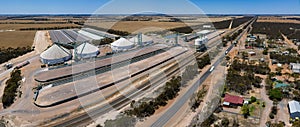 Aerial panoramic view of Grass Patch with large grain silos near the Coolgardie-Esperance Highway