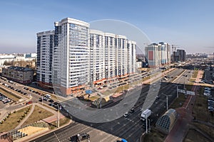 aerial panoramic view from great height of city with a private sector and high-rise urban apartment skyscraper buildings