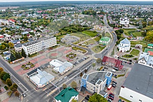 aerial panoramic view from great height of provincial town with a private sector and high-rise urban apartment buildings