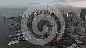 Aerial panoramic view of group of modern high rise downtown buildings in Financial District at dusk.