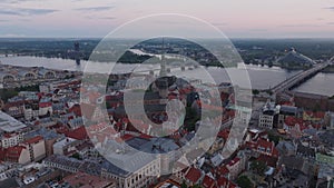 Aerial panoramic view of historic city centre with St. Peters Church and tourist sights near Daugava river. Modern