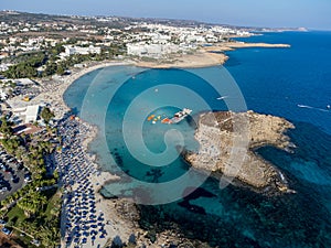 Aerial panoramic view on holidays villas and blue crystal clear water on Mediterranean sea near Nissi beach, Ayia Napa, Cyprus