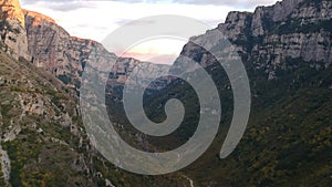 Aerial panoramic view of the impressive Vikos gorge in the Zagoria region at Pindus Mountains of northern Greece. It lies on the