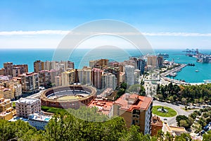 Aerial panoramic view of Malaga city with the bullring, Andalusia, Spain in a beautiful summer day