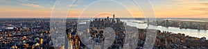 Panoramic view of New York City at Sunset . Brooklyn left, Midtown and Lower Manhattan center with Jersey City right photo