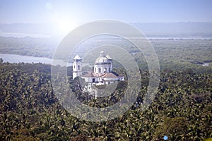 Aerial panoramic view Old Goa. Mandovi river and ancient Churche photo