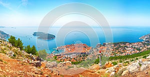Aerial panoramic view of the old town of Dubrovnik from Srd mountain on a sunny day