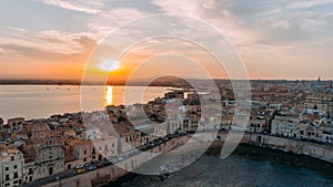 Aerial panoramic view of Ortigia island,old town of Syracuse.Small island on Sicily,Italy.Sicilian vacation,charming Italian