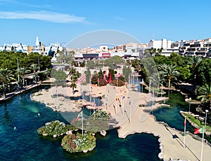 Aerial panoramic view pond, shape of the European continent in the Park of Nations and Torrevieja cityscape