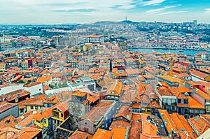 Aerial panoramic view of Porto Oporto city historical centre with red tiled roof typical buildings