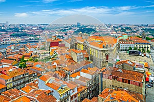 Aerial panoramic view of Porto Oporto city historical centre with red tiled roof typical buildings