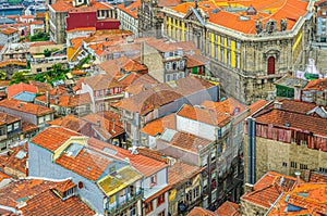Aerial panoramic view of Porto Oporto city historical centre with red tiled roof typical buildings