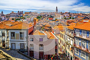 Aerial panoramic view of Porto Oporto city historical centre with red tiled roofs, typical traditional buildings