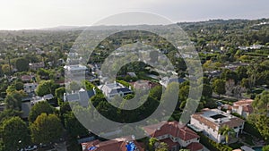 Aerial panoramic view of residential urban neighbourhood. Buildings surrounded by trees and other greenery,