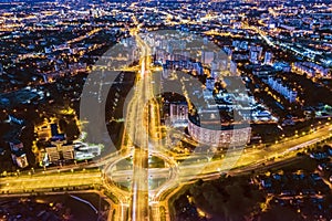 Aerial panoramic view of roundabout intersection at night