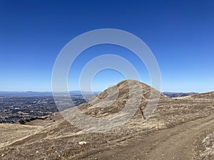 Aerial panoramic view of San Francisco Bay Area from hiking trail leading to MIssion Peak during fall season