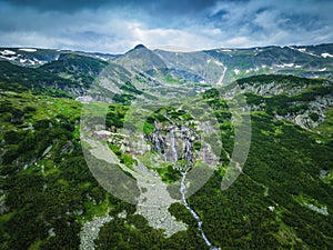 Aerial panoramic view of Seven Rila lakes and waterfalls in nature of mountain range, Bulgaria