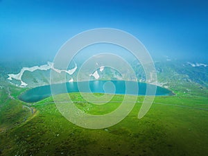 Aerial panoramic view of Seven Rila lakes and waterfalls in nature of mountain range, hiking, trekking and tourism in Bulgaria