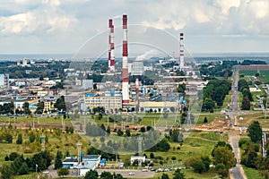 aerial panoramic view on smoke of pipes of chemical or wooden enterprise plant. Industrial landscape environmental pollution waste