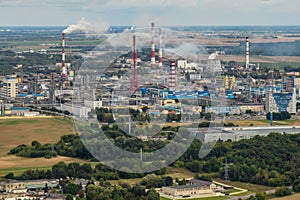 aerial panoramic view on smoke of pipes of chemical or wooden enterprise plant. Industrial landscape environmental pollution waste