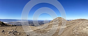 Aerial panoramic view of south San Francisco Bay Area from hiking trail leading to Mission Peak during fall season