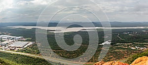 Aerial panoramic view of suburbs of Gaborone city surrounded by savannah and lake in the background, Gaborone, Botswana, Africa