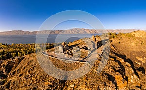 Aerial panoramic view of Surp Arakelots Holy Apostles church and chapel. Ancient Sevanavank Monastery complex and Sevan
