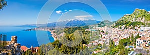 Aerial panoramic view of Taormina located in Metropolitan City of Messina, on east coast of Sicily island, Italy