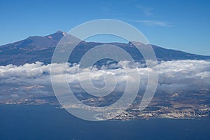 Aerial panoramic view on Tenerife island with peak of Mount Teide, volcatic landscape, Canary islands, Spain