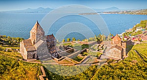 panoramic view to Sevanavank Monastery and chapel overlooking famous Sevan lake at sunny spring day. Travel and tourist