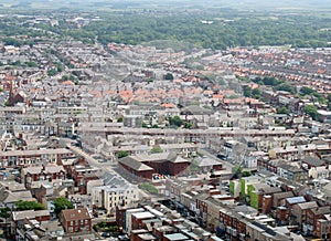 Aerial panoramic view of the town of blackpool looking east showing the streets and roads of the town with lancashire countryside