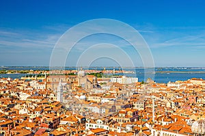 Aerial panoramic view of Venice city historical centre with old buildings red tiled roofs