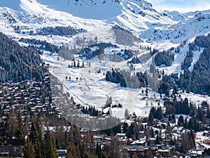 Aerial panoramic view of the Verbier ski resort town in Switzerland.