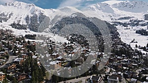 Aerial panoramic view of the Verbier ski resort town in Switzerland.