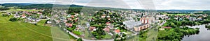 Aerial panoramic view of Vetrnik quarter in Dobris with cottagers part above Papez pond