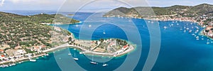 Aerial panoramic view of Vis Island port with St. Jeronima church prirovo beach and Adriatic coastline in summer photo