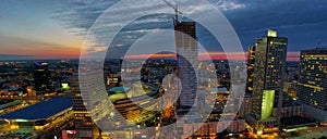 Aerial panoramic view at Warsaw downtown by night, from the top of Palace of Culture and Science, Warsaw, Poland