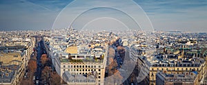 Aerial Paris cityscape panorama with view to Sacre Coeur Basilica of the Sacred Heart, France. Beautiful parisian architecture,