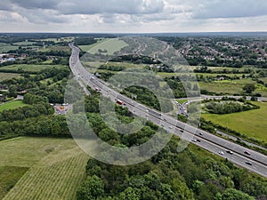 Aerial perspective of the busy A41 and M25 motorway interchange in London, England photo