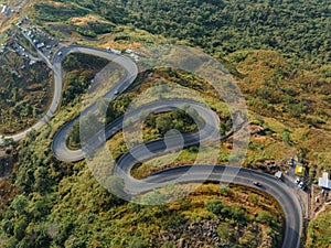 An aerial perspective showcases the intricate network of winding roads