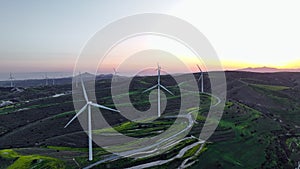 Aerial Perspective of Windmills Generating Electricity in Mountain Environment