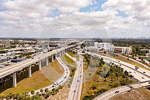 Aerial photo above the Golden Glades Interchange highway merge lanes with flyover