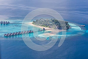 Aerial photo. Amazing beach in Maldives. Blue sky clouds and relaxing seascape