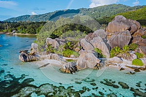 Aerial photo of amazing granite Rocks on beautiful paradise tropical beach Anse Source D Argent at La Digue island