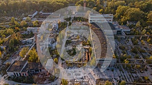 Aerial photo of brick`s making plant complex with manufacturing buildings and trees